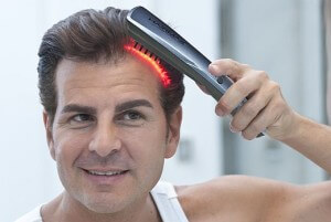 Laser comb hair regowth treatment